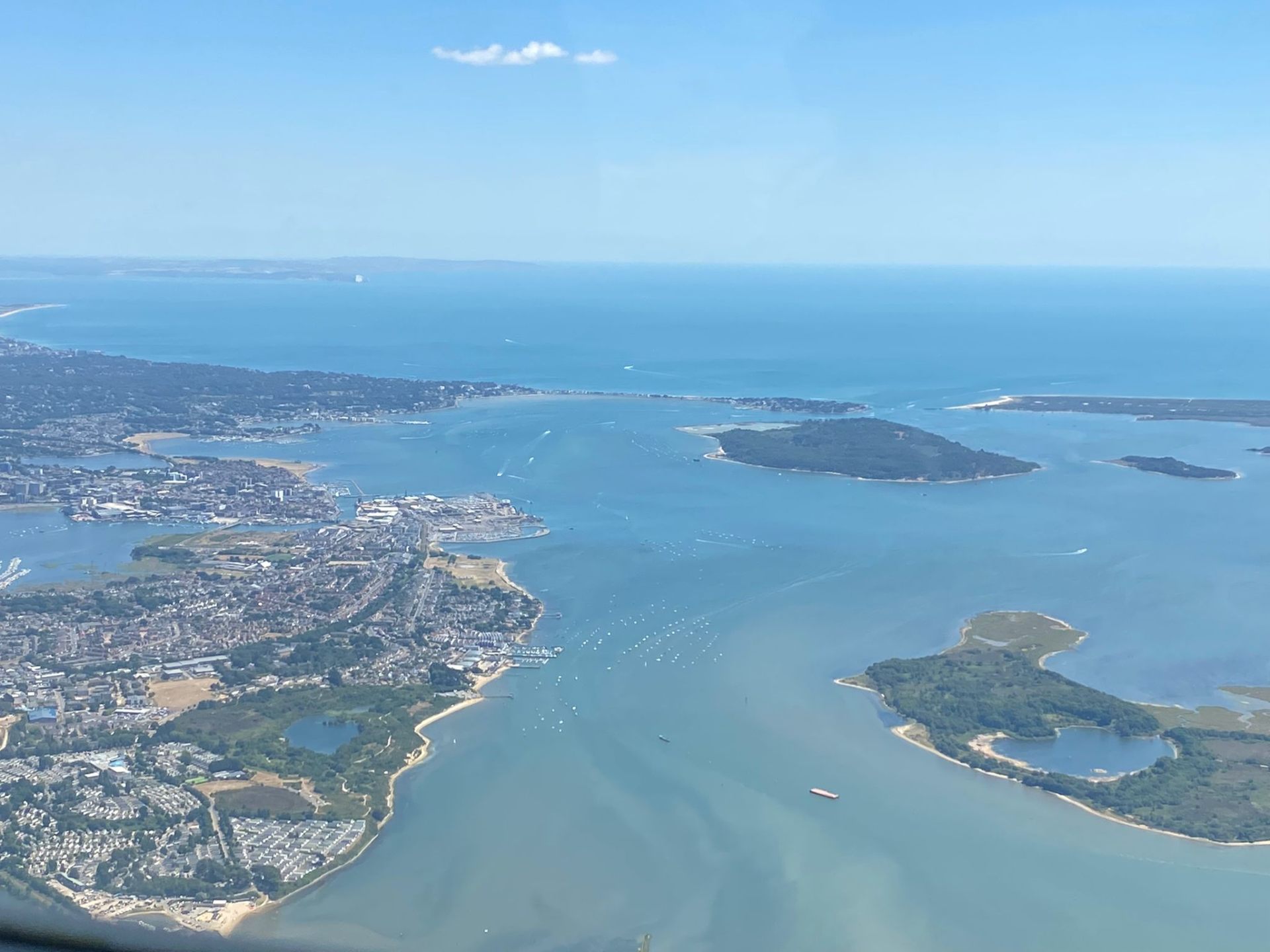 Aerial view of Poole Harbour, one of the world's largest natural harbours and home port for GSBY Leisure